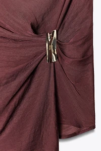 ASYMMETRIC TRIM TOP
