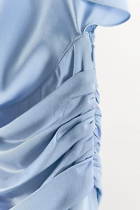 ASYMMETRIC CAPE SATIN EFFECT DRESS