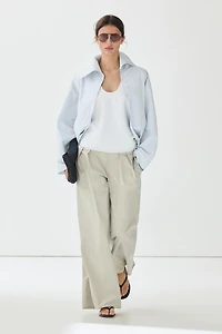 Wide-leg pants with pleated sash detail