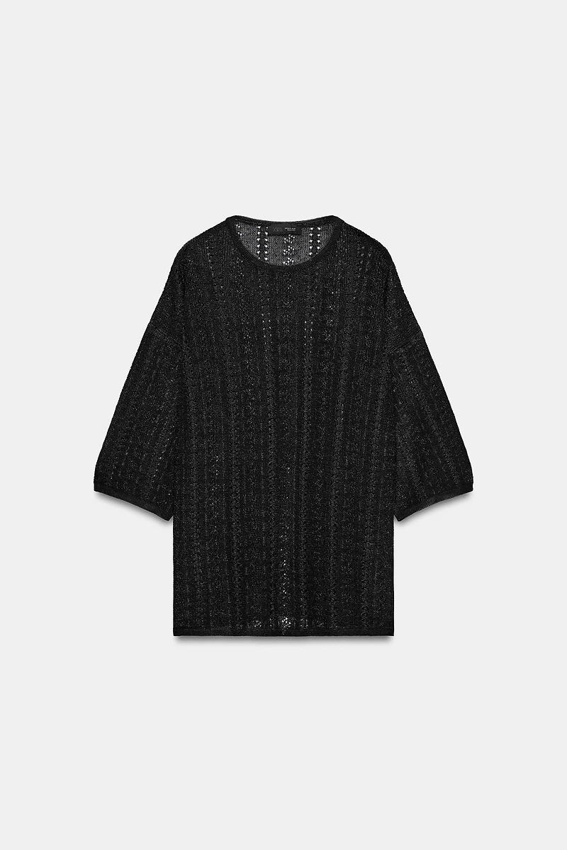 PULL EN MAILLE POINTELLE À OUVERTURES