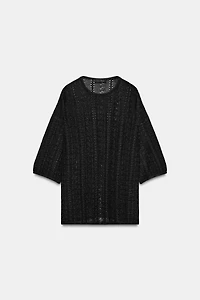 PULL EN MAILLE POINTELLE À OUVERTURES