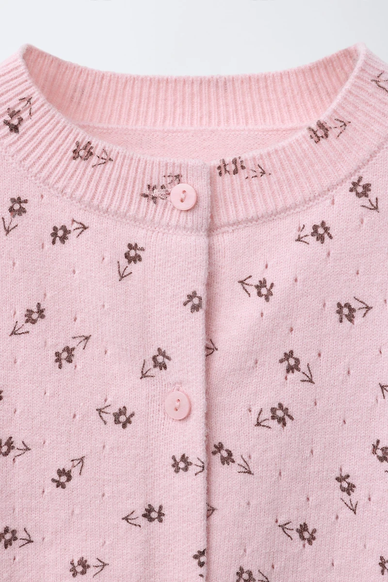GILET EN MAILLE À FLEURS