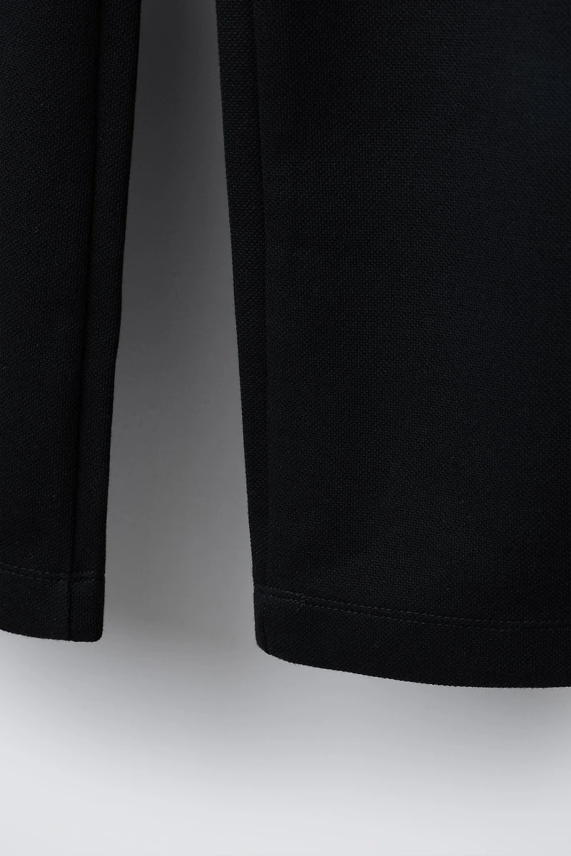 BUCKLED SUIT PANTS