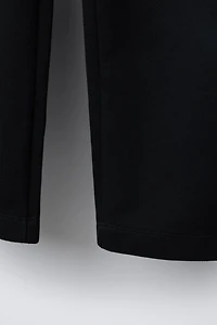 BUCKLED SUIT PANTS