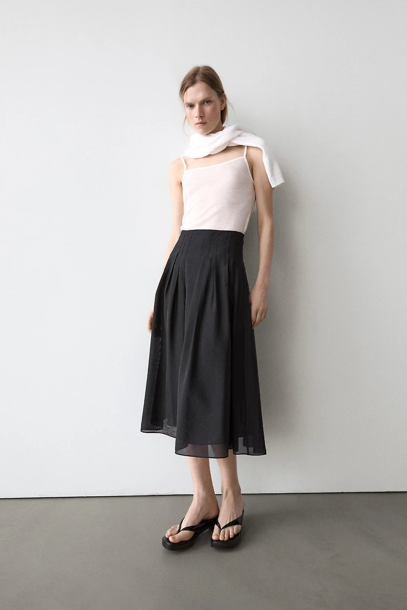 Flowing midi skirt with pintucks