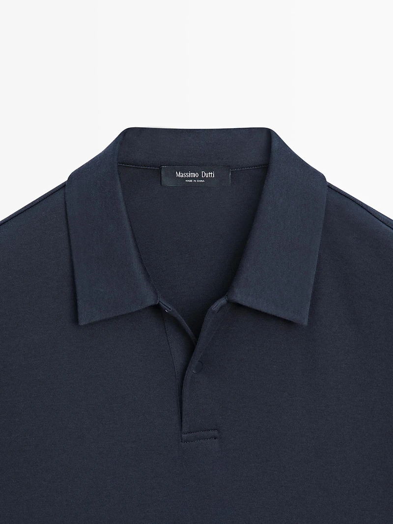 Polo à manches longues avec bouton-pression