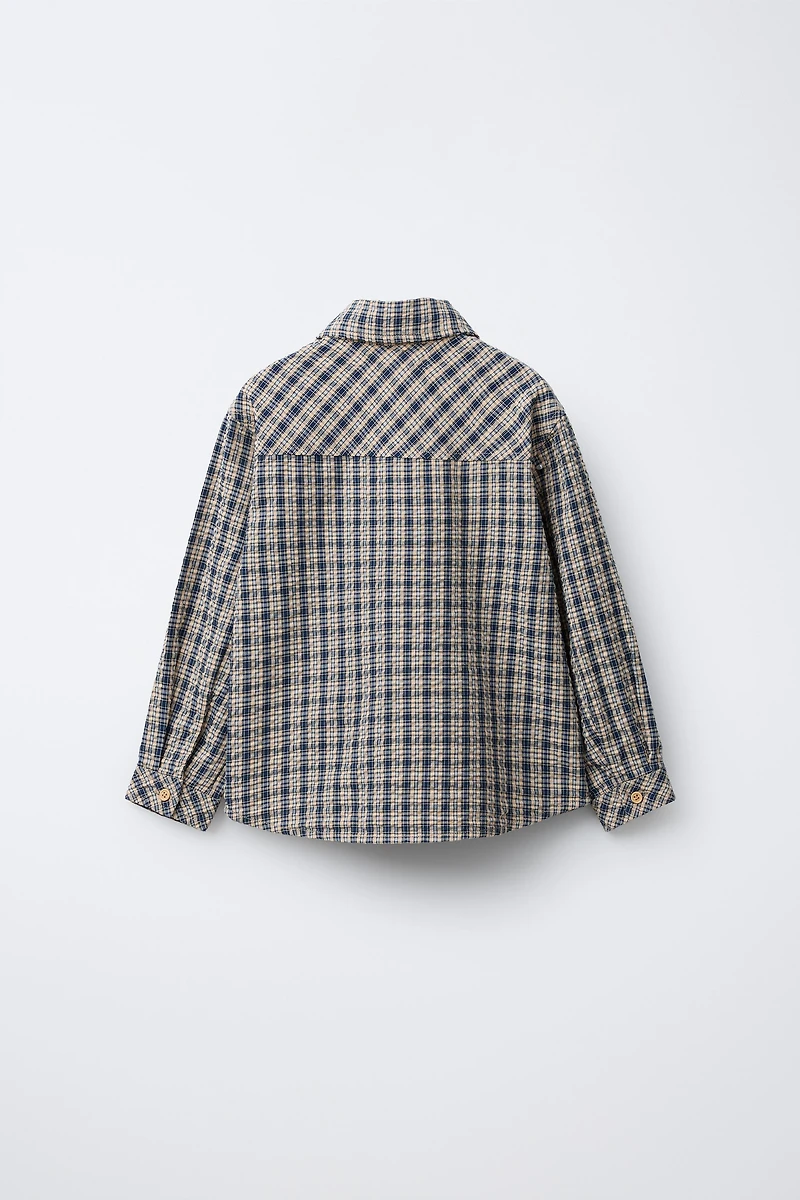 PLAID SHIRT SNOOPY PEANUTS™
