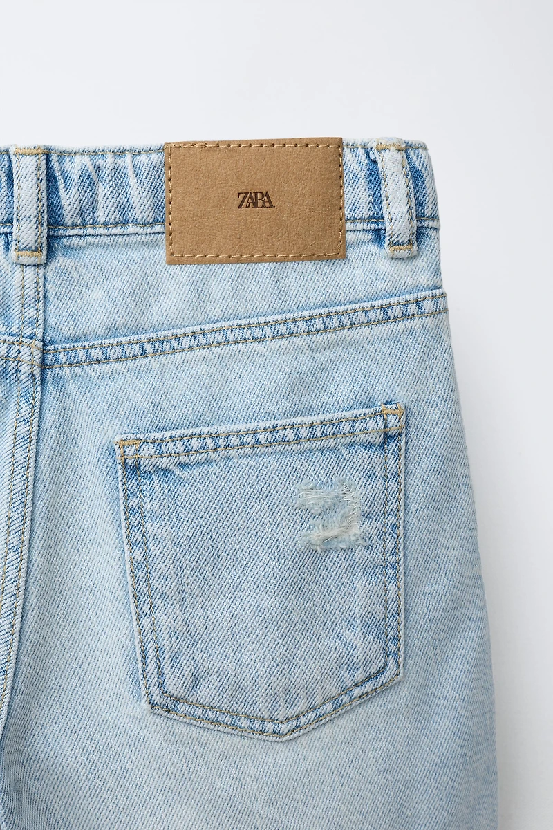BERMUDA EN JEAN BAGGY DÉCHIRÉ