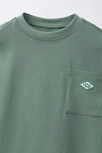 T-SHIRT POCHE ET PIÈCE