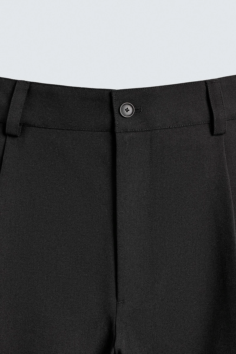 PLEATED BALLOON FIT PANTS