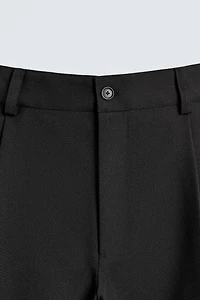 PLEATED BALLOON FIT PANTS