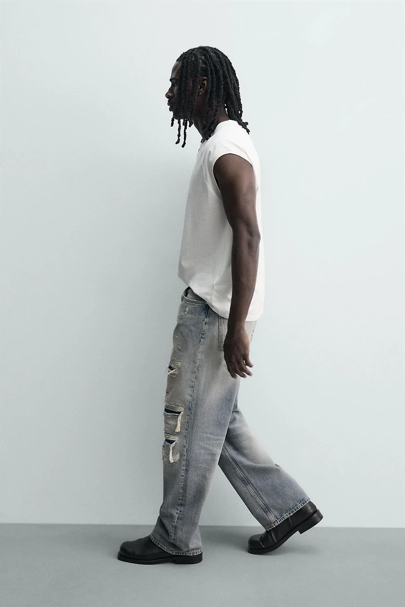 LOOSE FIT RIPPED JEANS