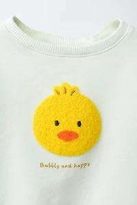 EMBROIDERED CHICK SWEATSHIRT