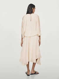 Flowing asymmetric midi skirt