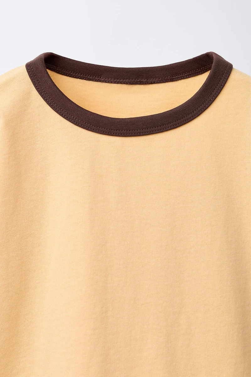 PLAIN T-SHIRT WITH CONTRASTING PIPING AT NECKLINE