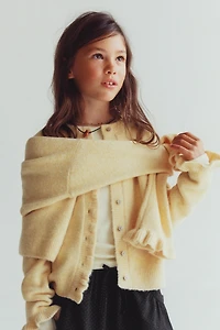 GILET EN MAILLE VOLANTS AVEC LAINE