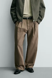 PLEATED BAGGY FIT CHINO PANTS