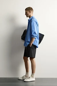 RELAXED FIT INTERLOCK TRACK SHORTS