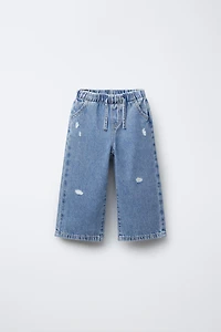 FLUID RIPPED WIDE LEG JEANS