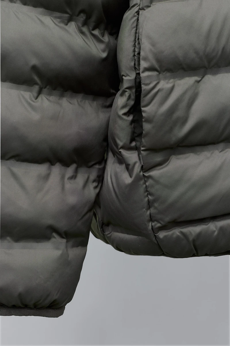 VESTE ULTRALÉGÈRE À CAPUCHE DÉPERLANTE