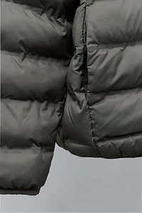 VESTE ULTRALÉGÈRE À CAPUCHE DÉPERLANTE