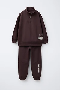 ENSEMBLE SWEAT ZIPPÉ ET PANTALON DE JOG AVEC ÉTIQUETTES