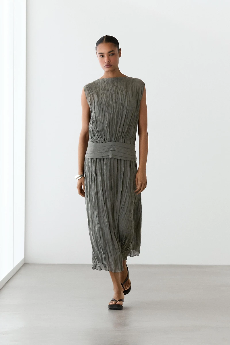 Textured flowing fabric dress with sash belt