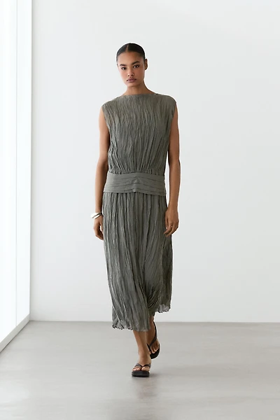 Textured flowing fabric dress with sash belt