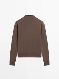 Mock turtleneck button-up sweater