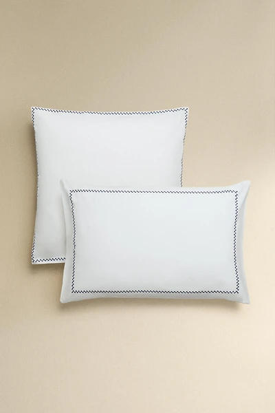 TAIE D’OREILLER BRODERIE BORDURE