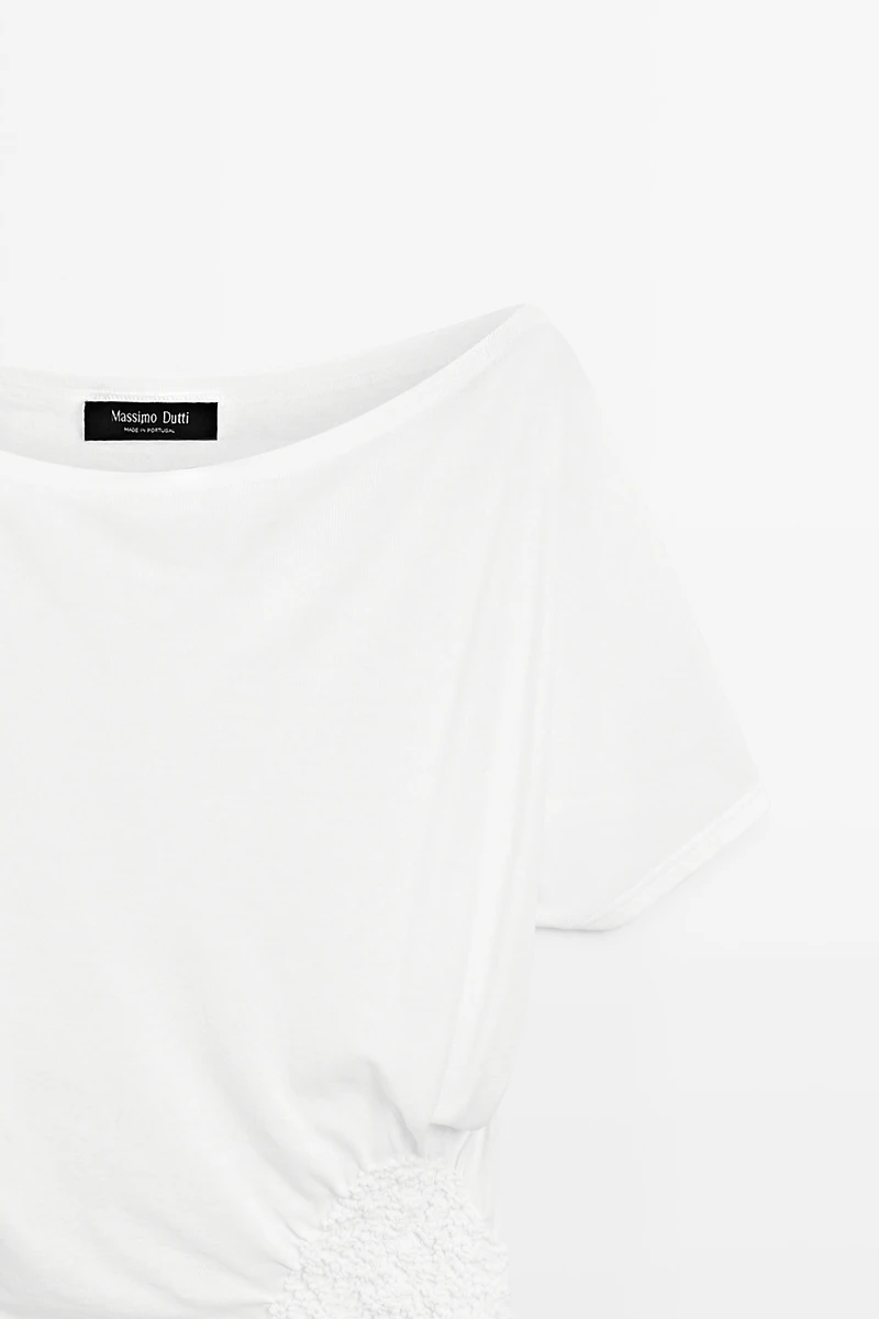 Asymmetric top with embroidered detail