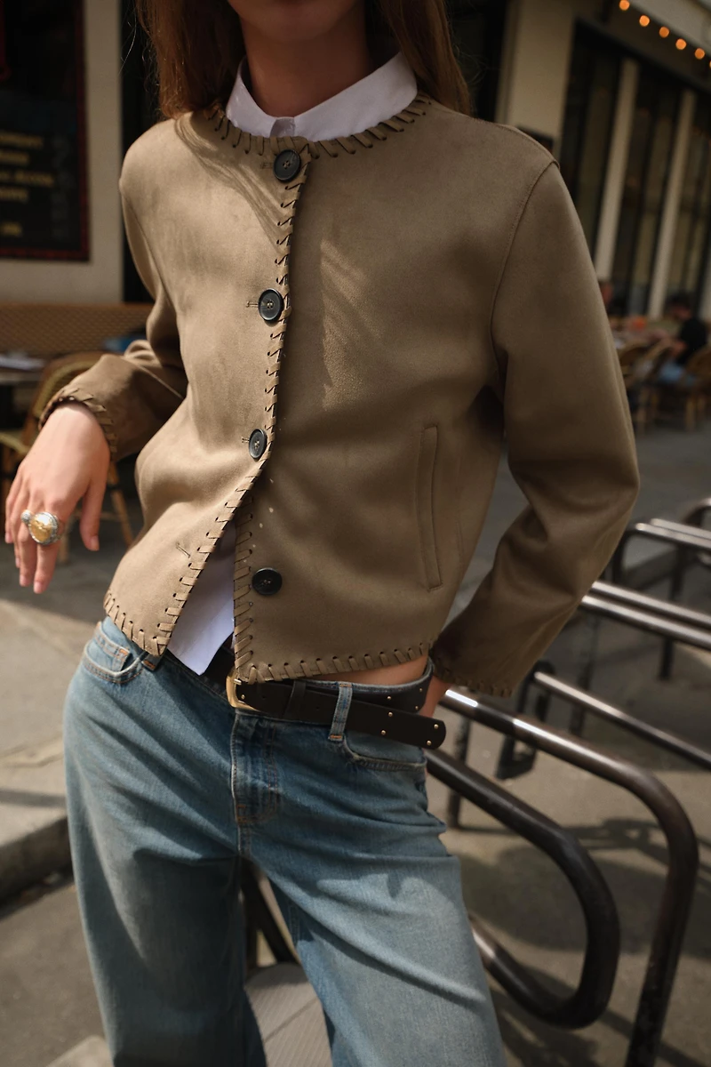 VESTE EFFET DAIM FINITIONS TRESSÉES