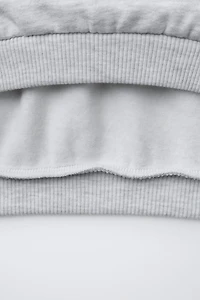 SWEAT AVEC PIÈCES