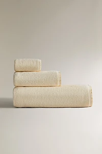 BATH TOWEL WITH TRIM DETAIL