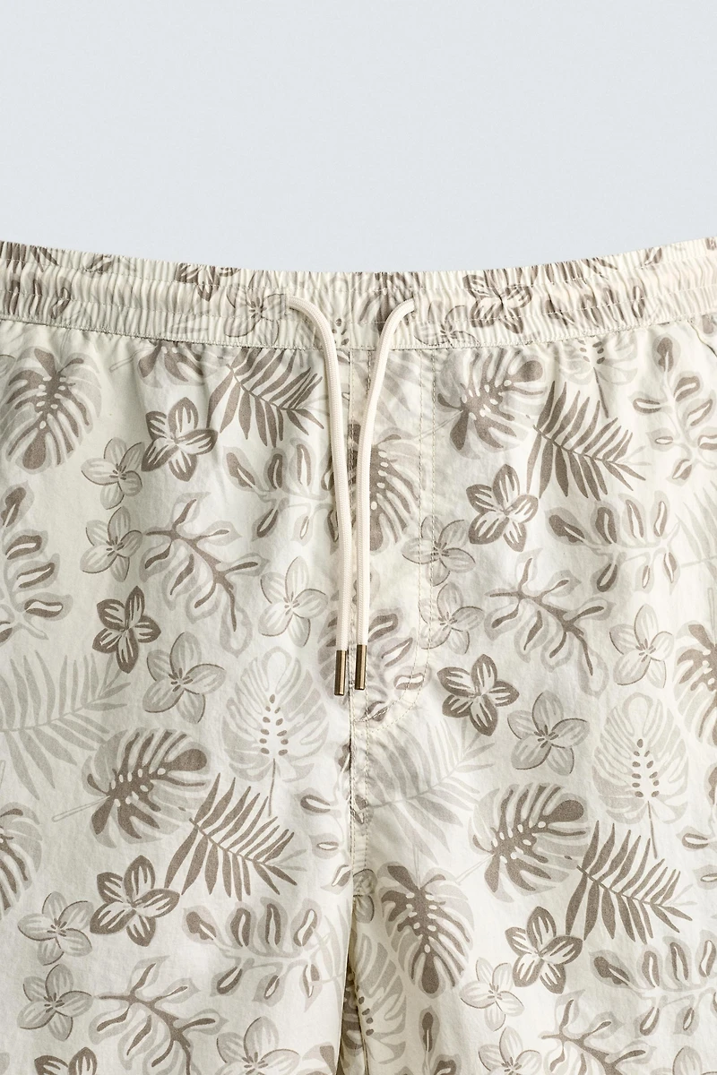 LONG FLORAL PRINT SWIM SHORTS
