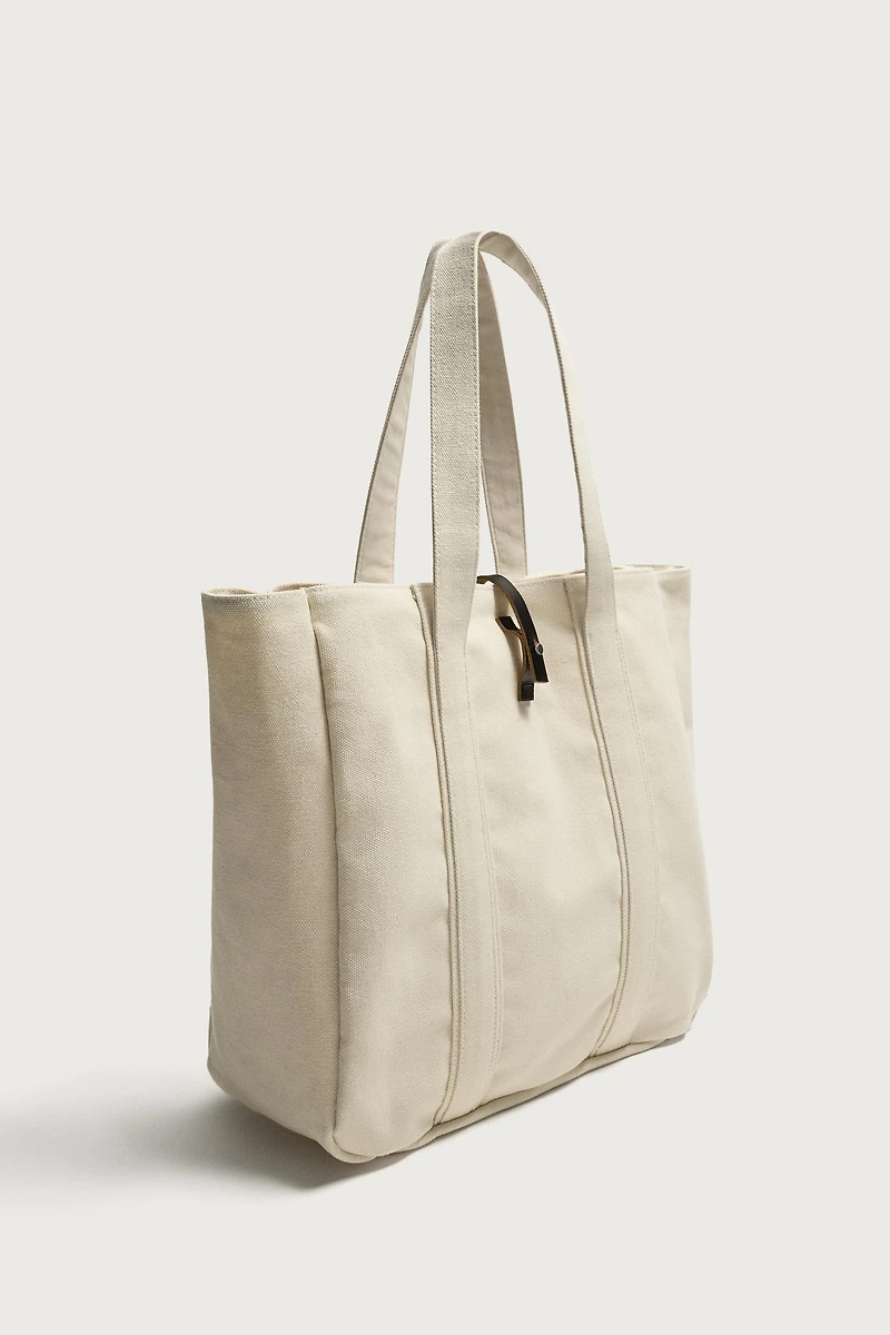 SHOPPER EN TISSU AVEC FERMETURE CUIR