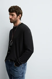 100% WOOL SWEATER
