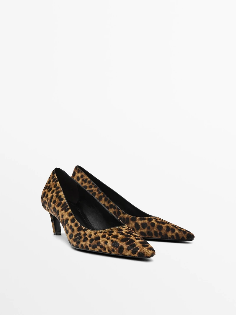 Heeled leopard print shoes