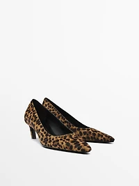 Heeled leopard print shoes