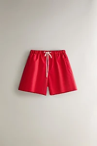 RED MID-LENGTH BEACH SHORTS