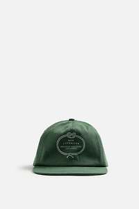 CASQUETTE DÉLAVÉE AVEC IMPRIMÉ COMBINÉ