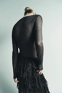 ROBE EN MAILLE FIL MÉTALLISÉ FRANGES