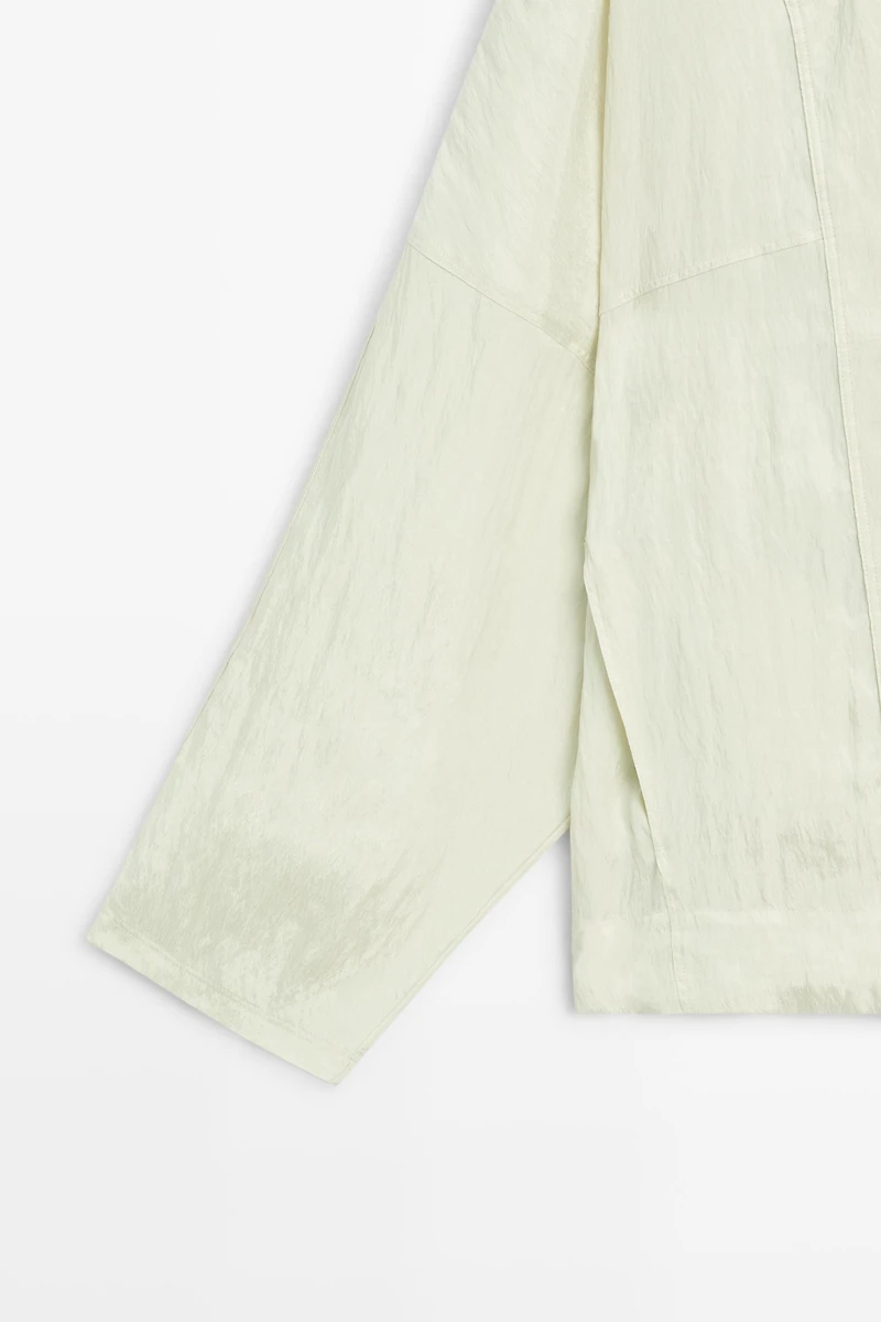 Fluid wrap shirt with button detail