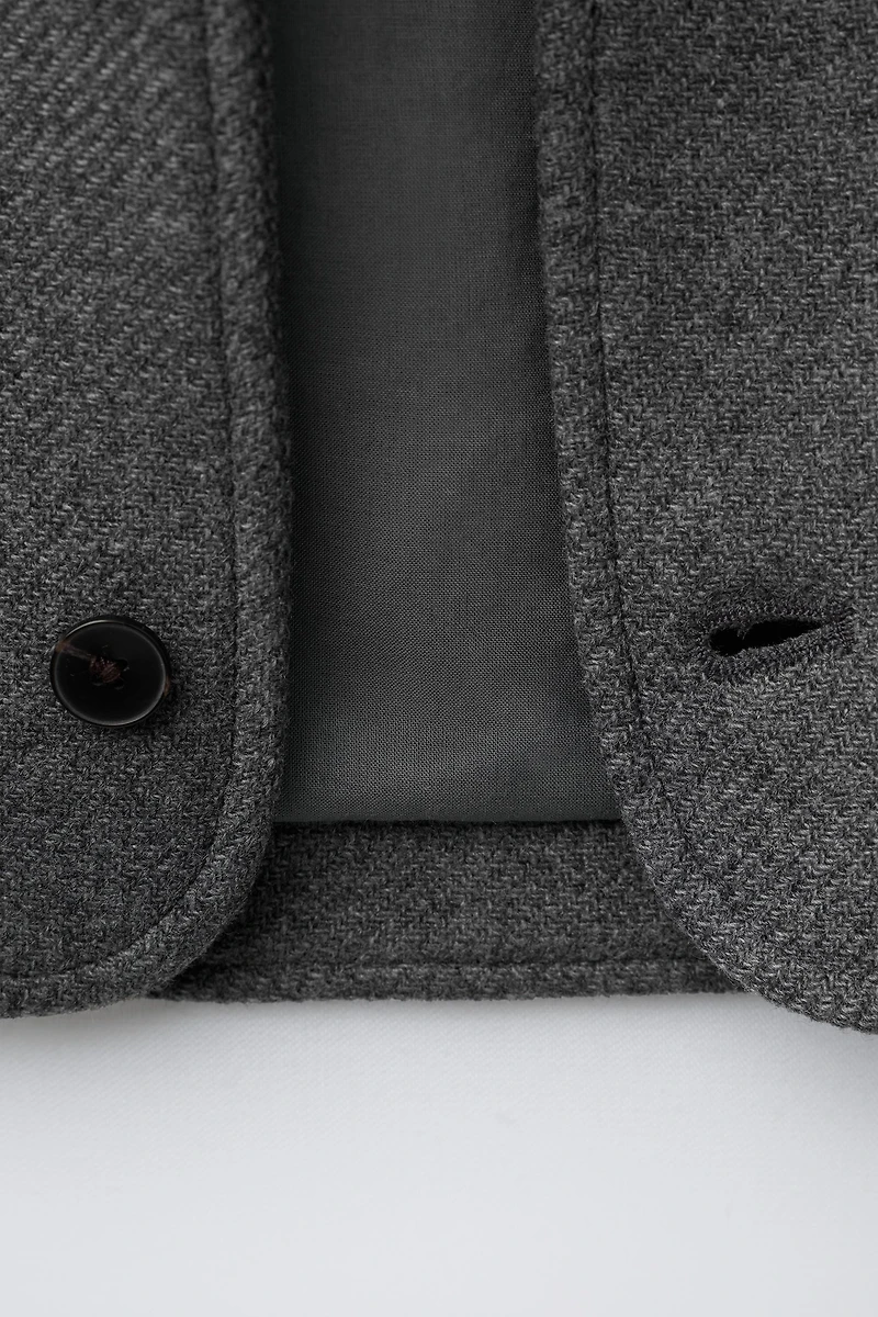 MANTEAU MANTECO À CAPUCHE