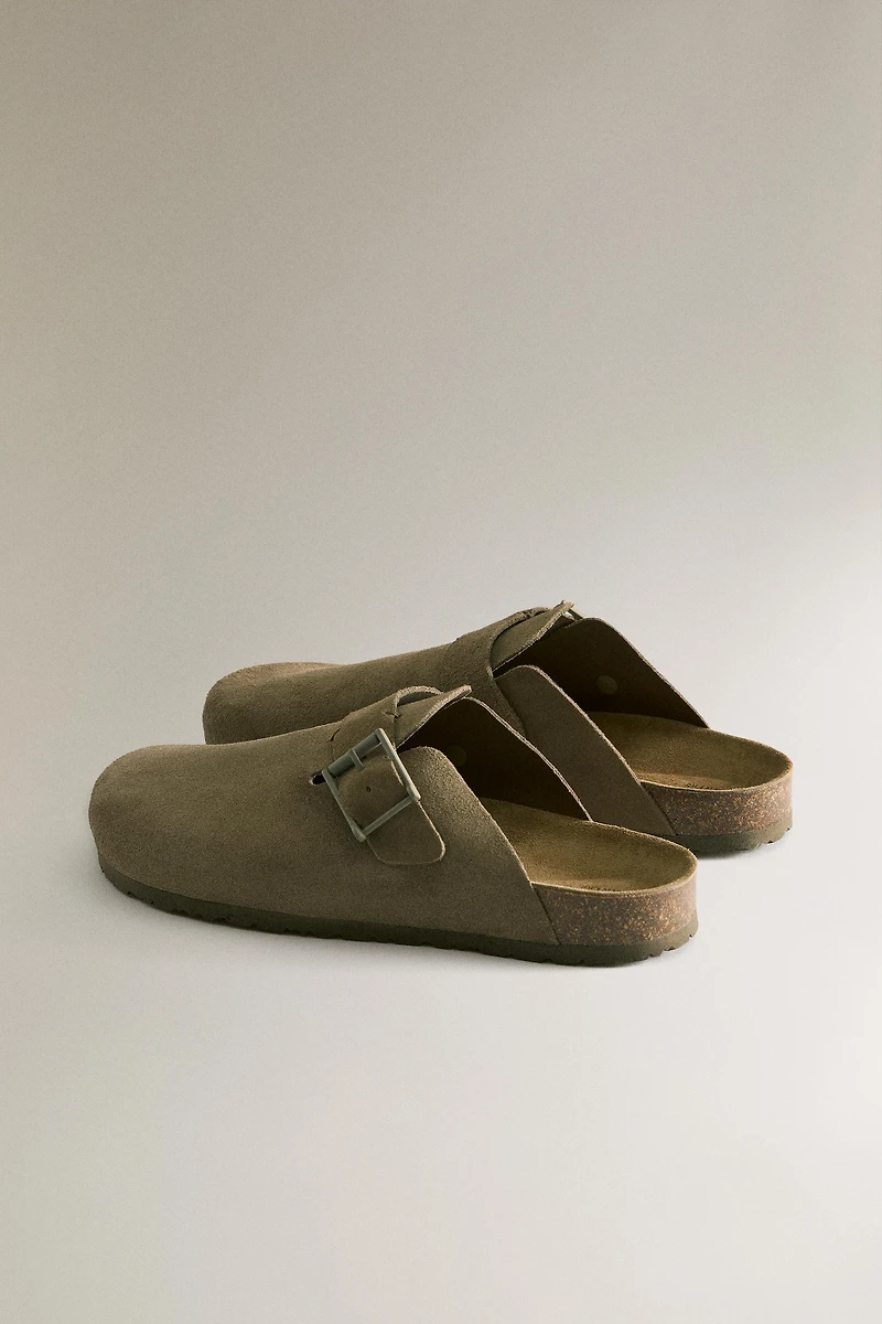 LEATHER MULE CLOG SLIPPERS WITH BUCKLE AND TOPSTITCHING DETAIL