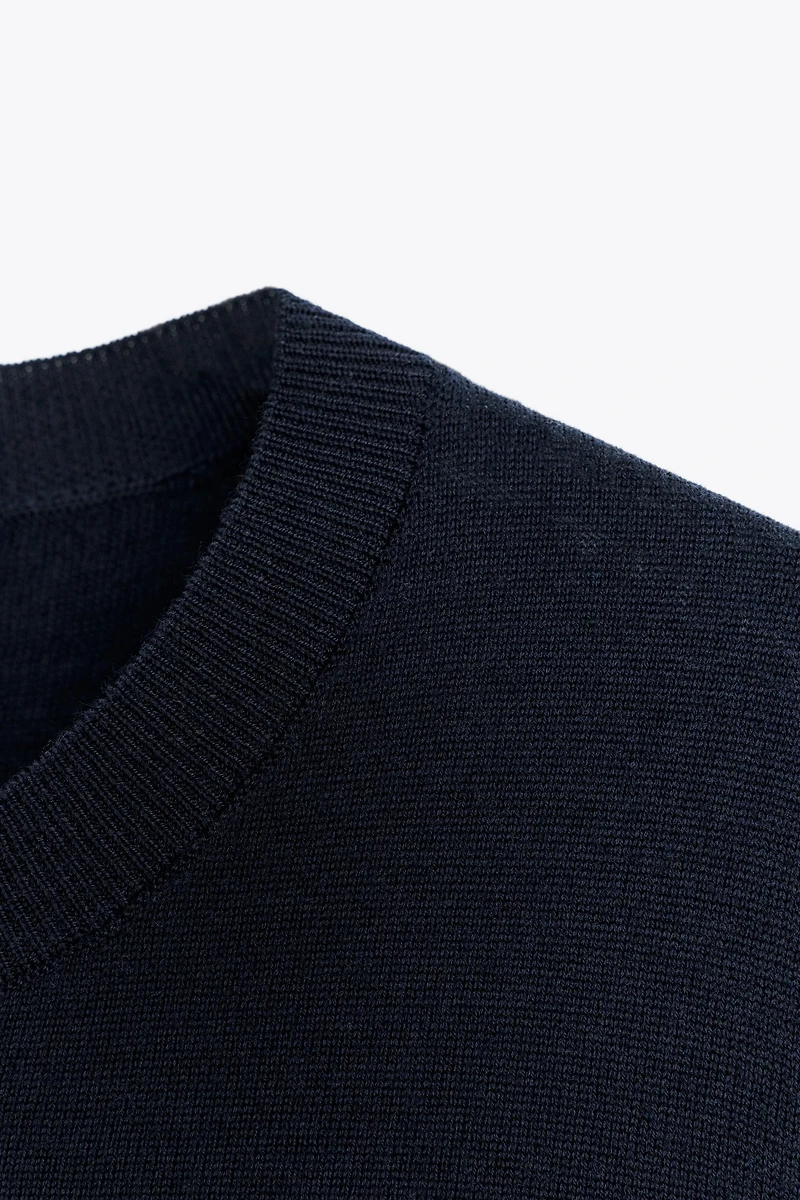 100% WOOL SHORT SLEEVE SWEATER