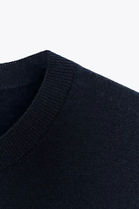 100% WOOL SHORT SLEEVE SWEATER