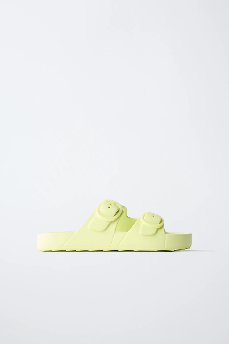 RUBBERIZED BUCKLED SANDALS