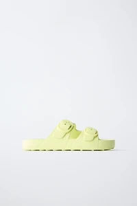 RUBBERIZED BUCKLED SANDALS