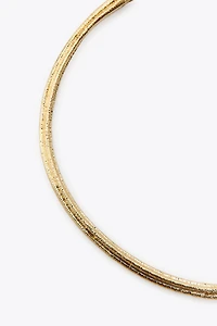 COLLIER RAS DU COU TEXTURÉ